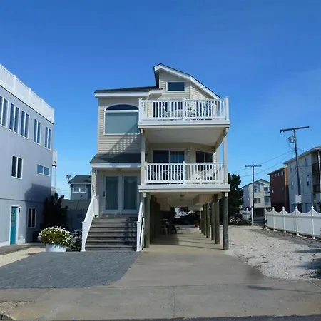This Single Family Home Is Just A Few Houses From The Beach! All The Comforts Of Home Are Provided, Including A Washer-Dryer, Dishwasher, Gas,
